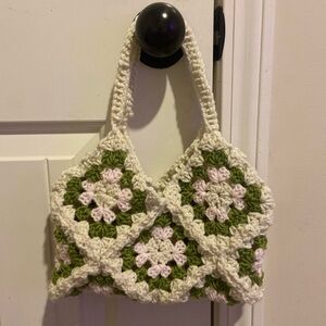 Handmade crochet green, pink and white granny square bag in size extra small